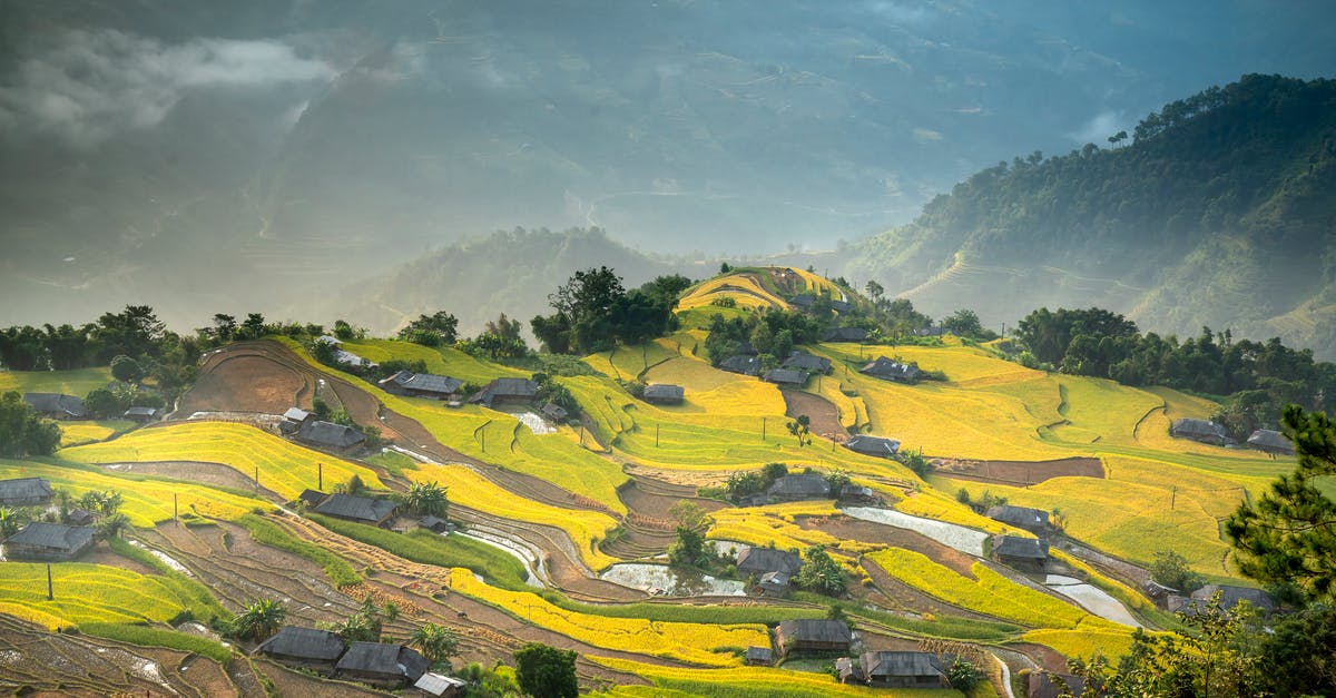 No pokemon in remote rural areas? [duplicate] - Agricultural fields and rural houses on lush hilly terrain