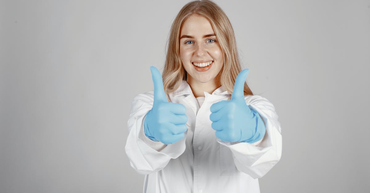 No PokeStops, Gyms, or nearby Pokemon showing up [duplicate] - Woman in White Coat Smiling