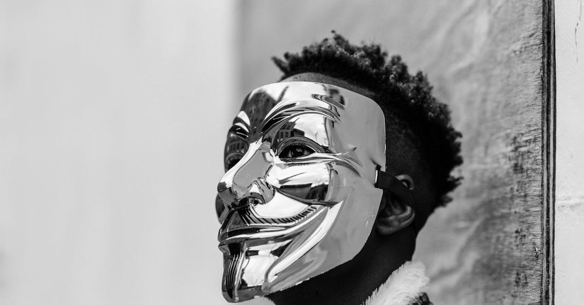 No policy for murder? - Black activist wearing Anonymous mask as sign of protest