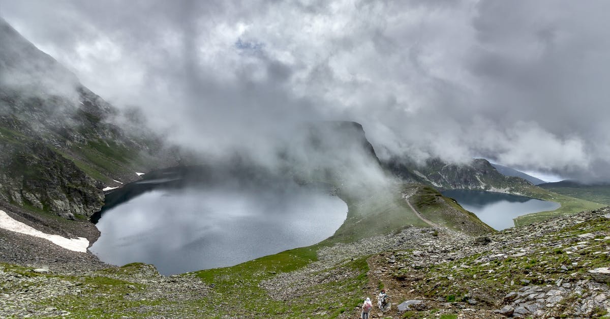 No water in the region - Green Grass Covered Ground Near Body of Water Under Gray Cloudy Sky No water in the region - Green Grass Covered Ground Near Body of Water Under Gray Cloudy Sky