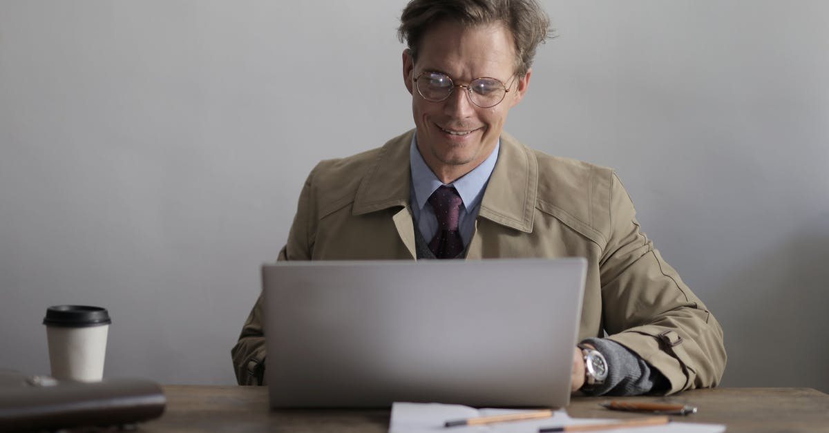 Not able to connect to Minecraft server after client joins on specific PC - Smiling male writer using netbook in creative cafeteria