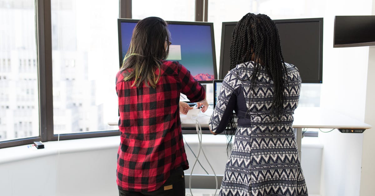 Not connecting to servers for Fifa 15 UT - Two Women Standing in Front of Television Not connecting to servers for Fifa 15 UT - Two Women Standing in Front of Television
