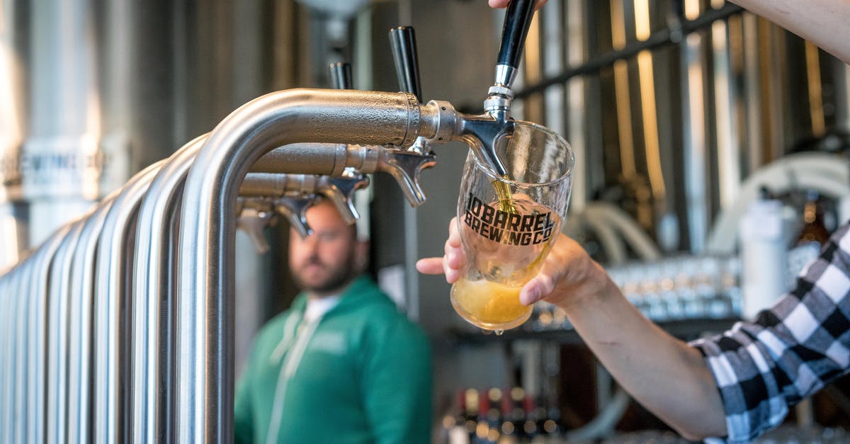 Nothing in city production list, unable to select anything to build - Person Filling Drinking Glass With Beer on Tap Nothing in city production list, unable to select anything to build - Person Filling Drinking Glass With Beer on Tap