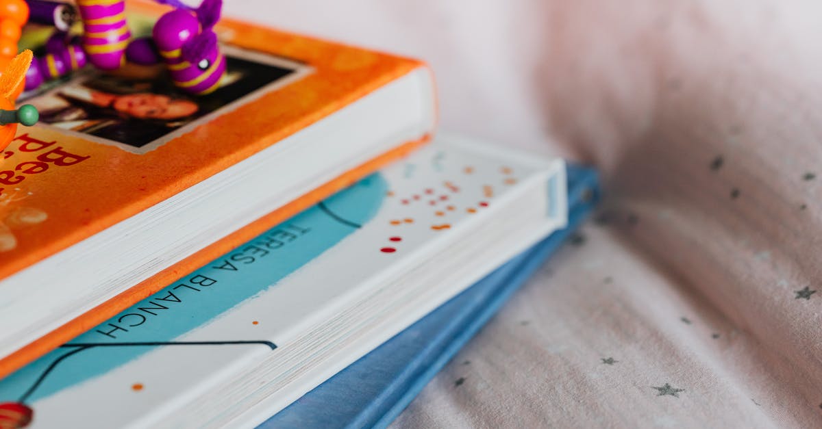 Number next to a Guardian's name? - Close-up of a Pile of Books