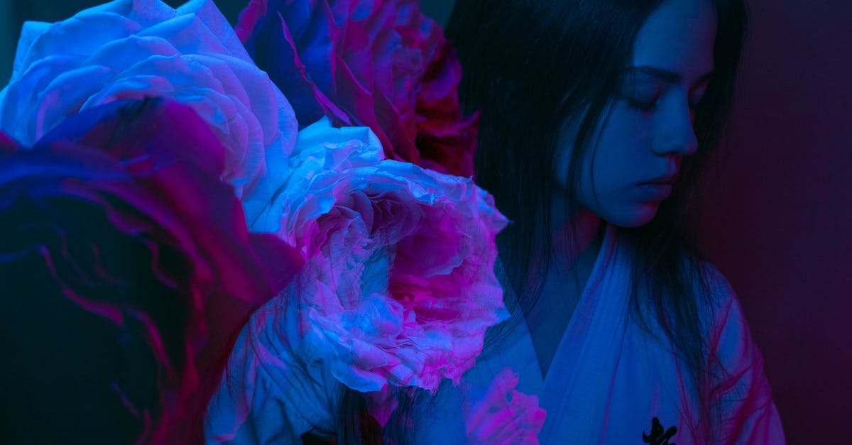 Obtaining Cloth in A Dark Room - Roses against pensive young female in bathrobe Obtaining Cloth in A Dark Room - Roses against pensive young female in bathrobe