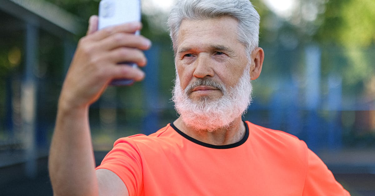 Old Hamachi Server won't connect - Serious aged man taking selfie on smartphone Old Hamachi Server won't connect - Serious aged man taking selfie on smartphone