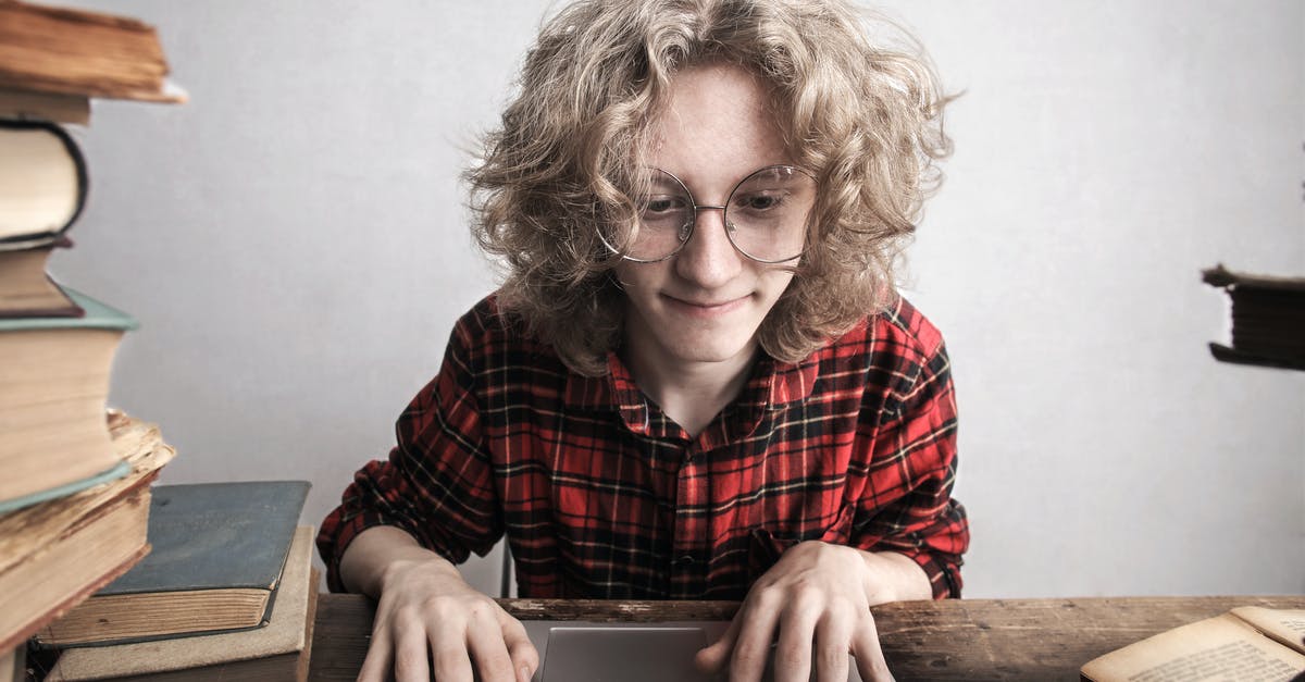 Old School RuneScape magic training: finding best items for high level alchemy? - Content young male student using laptop in library Old School RuneScape magic training: finding best items for high level alchemy? - Content young male student using laptop in library