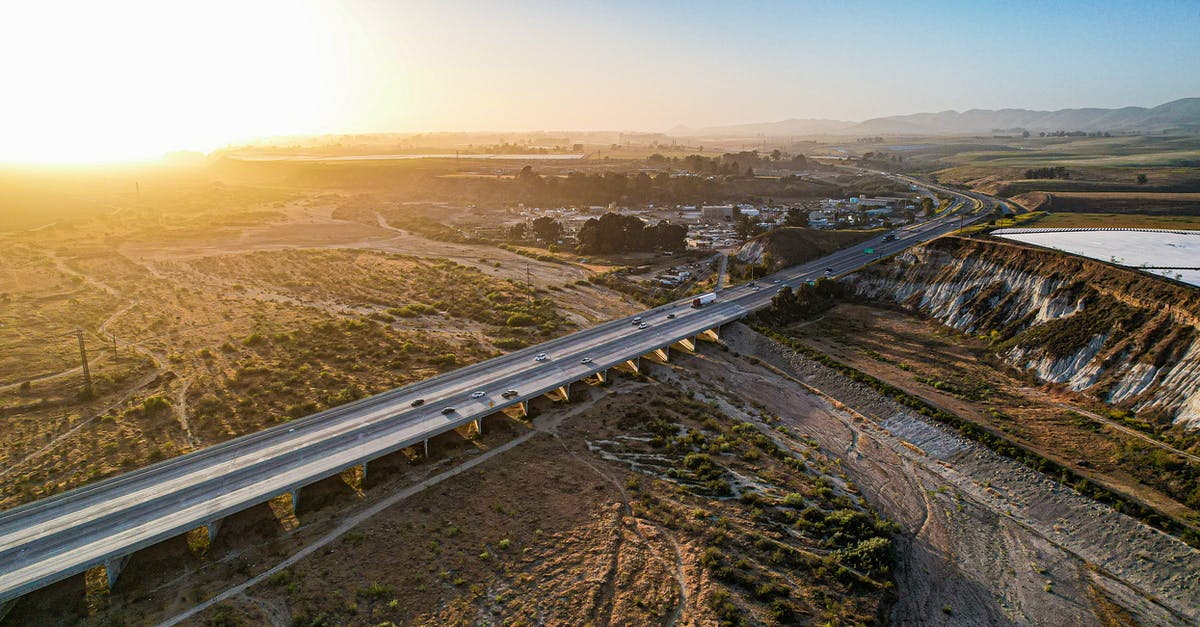 Oldschool RuneScape ironman: Motherlode Mine vs powermining - Aerial View of a Highway in the Middle of a Brown Field