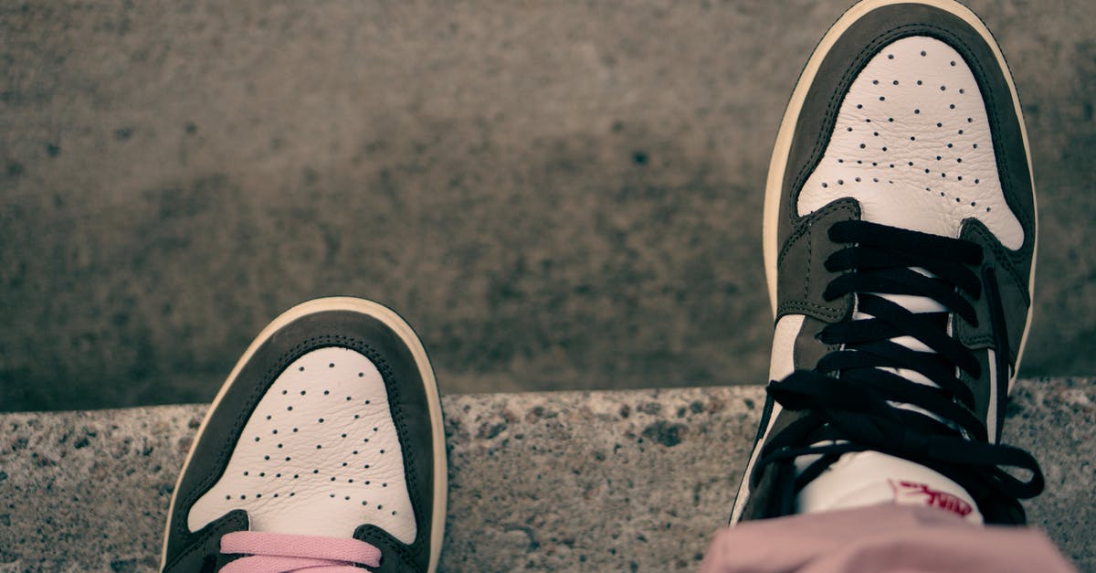 On what basis are tie-breakers decided in asphalt 8? - Person in stylish sneakers standing on steps