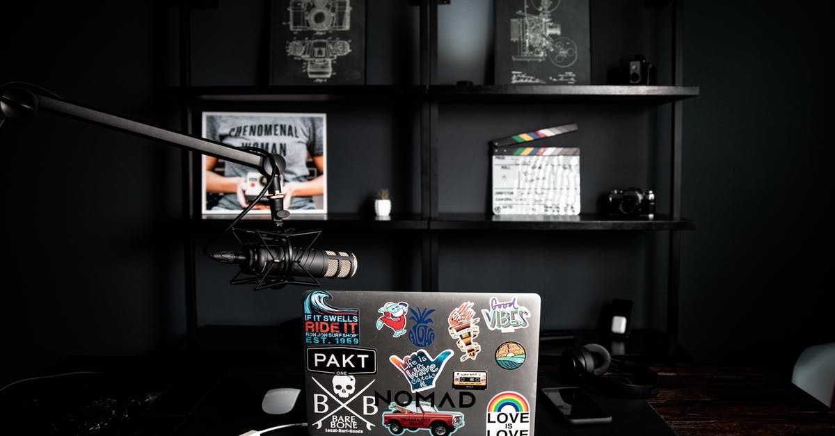 Opening CS:GO Sticker Capsules - Laptop with bright stickers near shelf with decorative frames