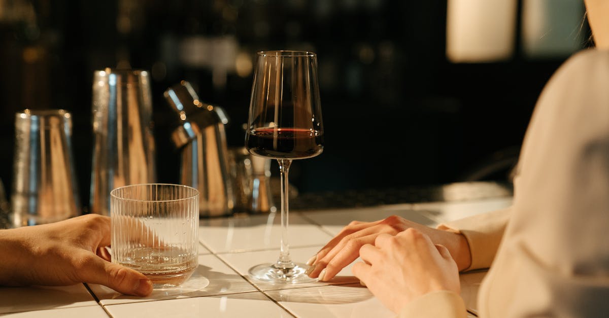 Orange bar on the side of chat - Person Holding Clear Wine Glass Orange bar on the side of chat - Person Holding Clear Wine Glass