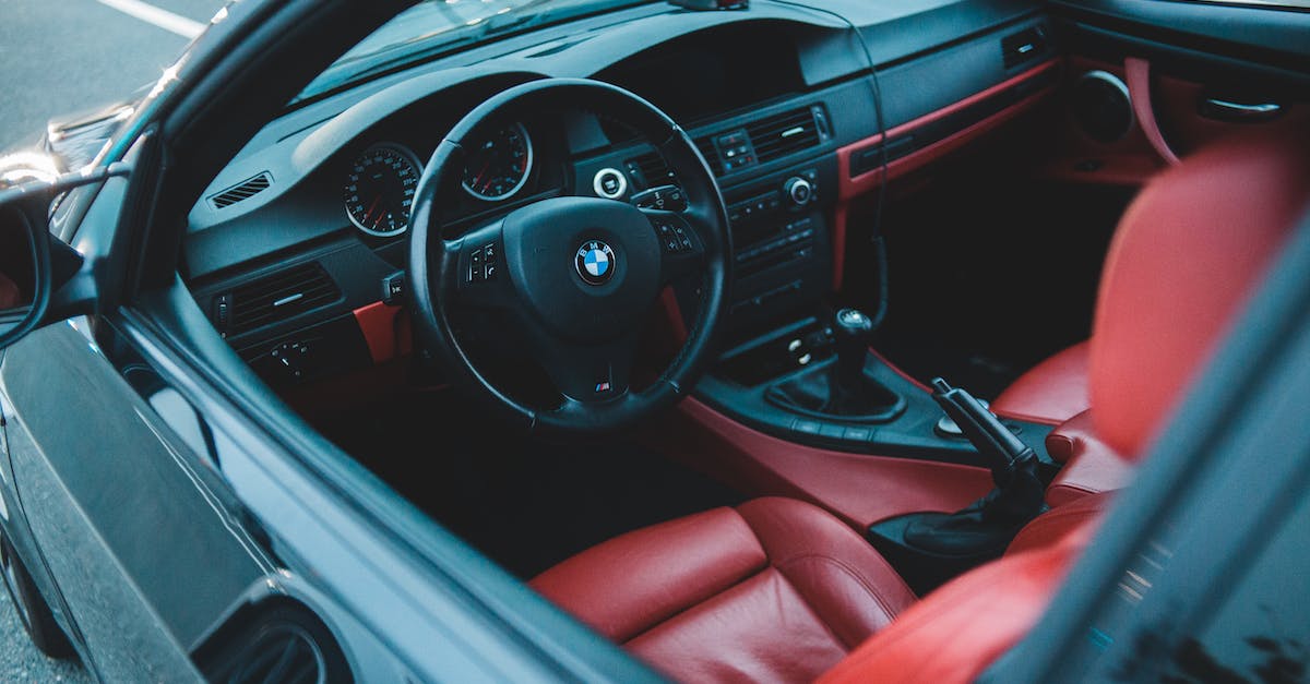 Order of Mirror Entity and Mind Control Tech Effect Resolutions [duplicate] - Modern comfortable interior of car with red leather seats and black stylish steering wheel on control panel