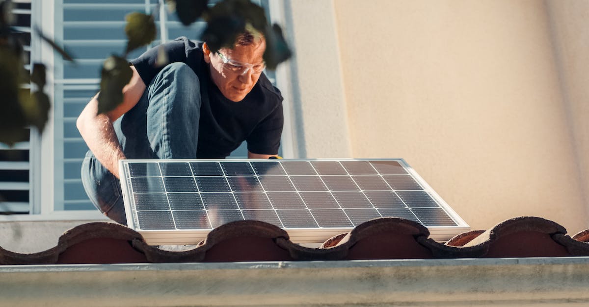 Order of technician calculation with accumulative power moves? - A Man in Black Shirt Installing a Solar Panel on the Roof