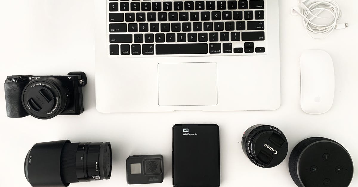 OS X - El Capitan Mouse Problem (After Alt-Tab) - Laptop with photo camera accessories on white background OS X - El Capitan Mouse Problem (After Alt-Tab) - Laptop with photo camera accessories on white background