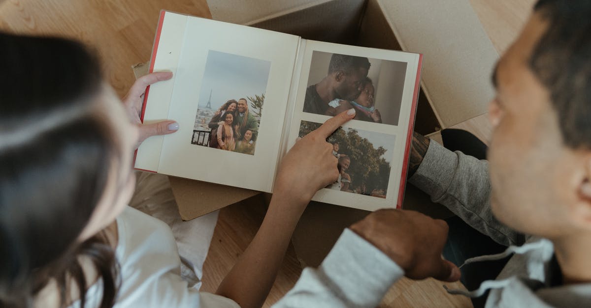 Overwatch Origin skins from loot boxes - Person Holding 2 Photos of 2 Women