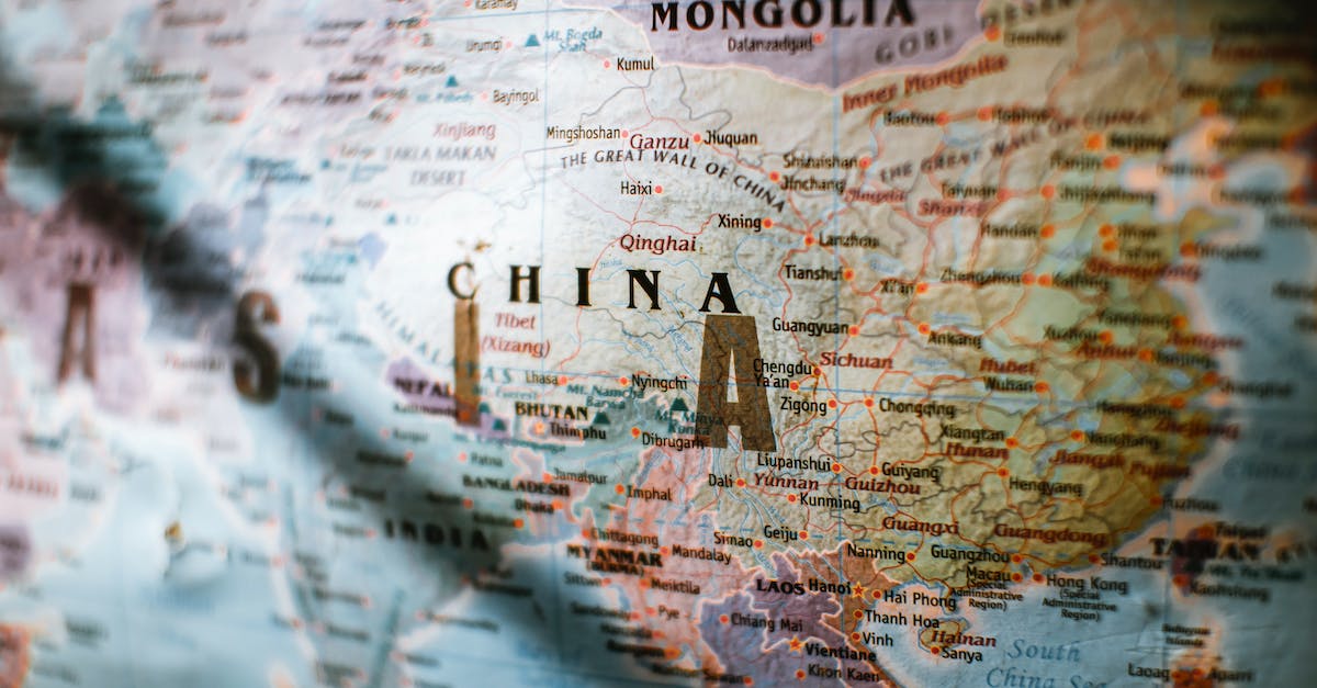 Owning a colony on the same continent as the capital? - Paper political world map with Asian countries borders and coastline near water