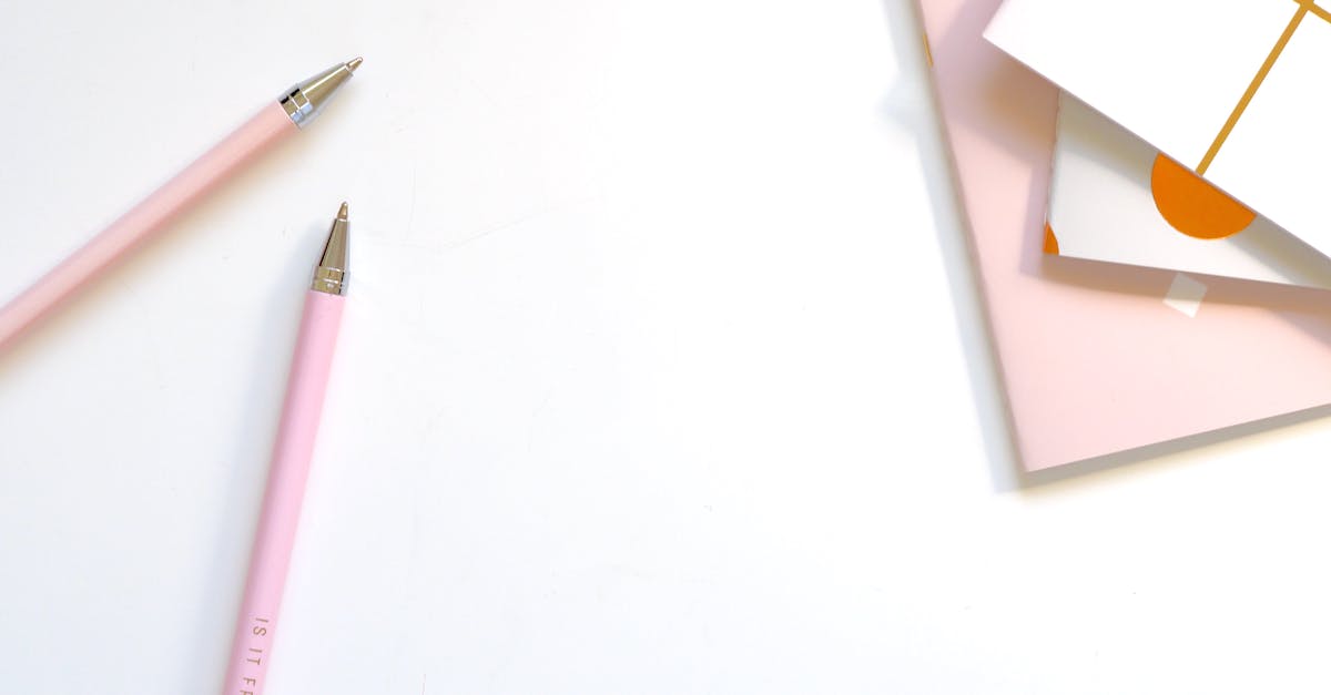 PAD Rank up grind locations - Two Pink Ballpoint Pens on Table PAD Rank up grind locations - Two Pink Ballpoint Pens on Table