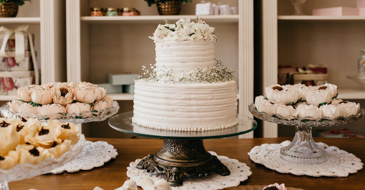 Paladin and truffle won't spawn - Wedding cake with floral decor between treats on table Paladin and truffle won't spawn - Wedding cake with floral decor between treats on table