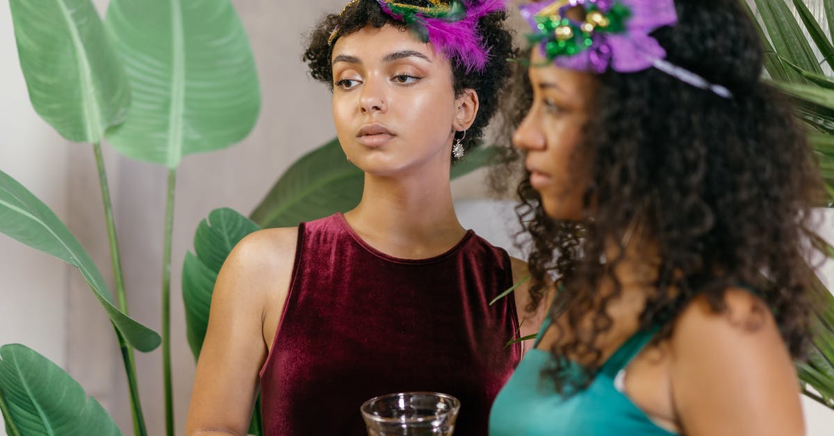 Party cinematics - Woman in Red Tank Top Holding Drinking Glass Party cinematics - Woman in Red Tank Top Holding Drinking Glass