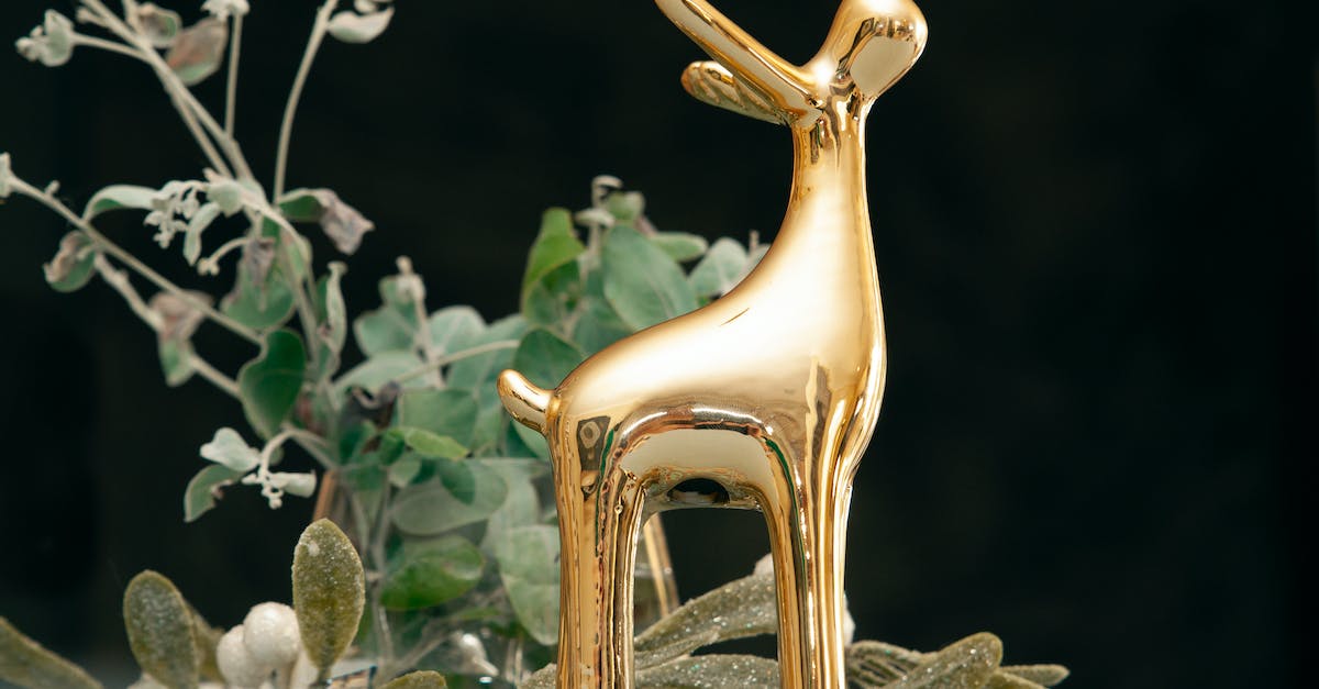 Persona 4 Golden Reaper Spawning - Gold Ceramic Dog Figurine on Glass Table Persona 4 Golden Reaper Spawning - Gold Ceramic Dog Figurine on Glass Table