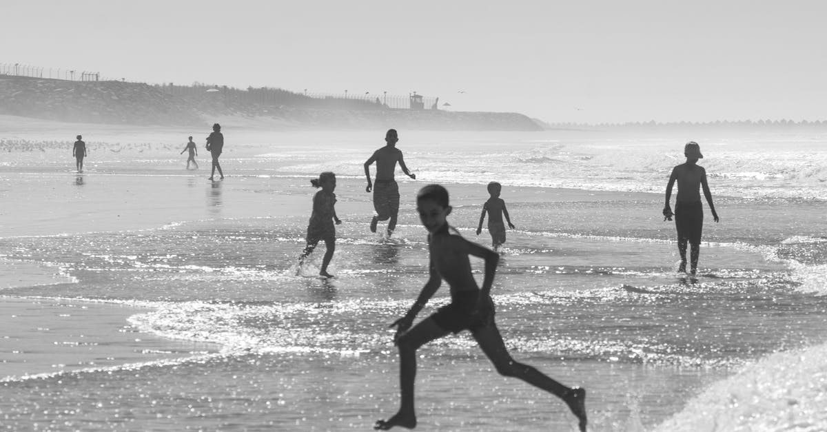 Phenomena in Pokemon Black and White - Kids running from sea waves on coast Phenomena in Pokemon Black and White - Kids running from sea waves on coast