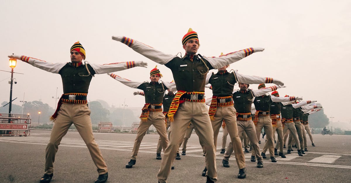 Physical resistance vs. Armor vs. Defence - Group of ethnic military men during exercising Physical resistance vs. Armor vs. Defence - Group of ethnic military men during exercising