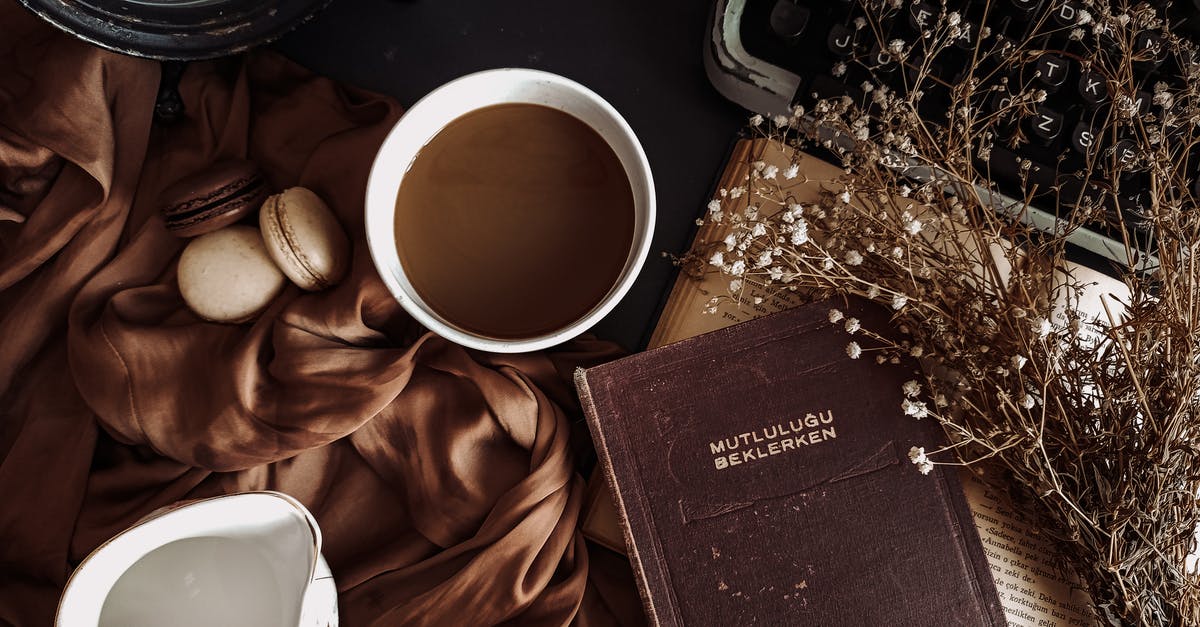 Pickable objects use? - White Ceramic Mug beside Brown Satin Textile Pickable objects use? - White Ceramic Mug beside Brown Satin Textile