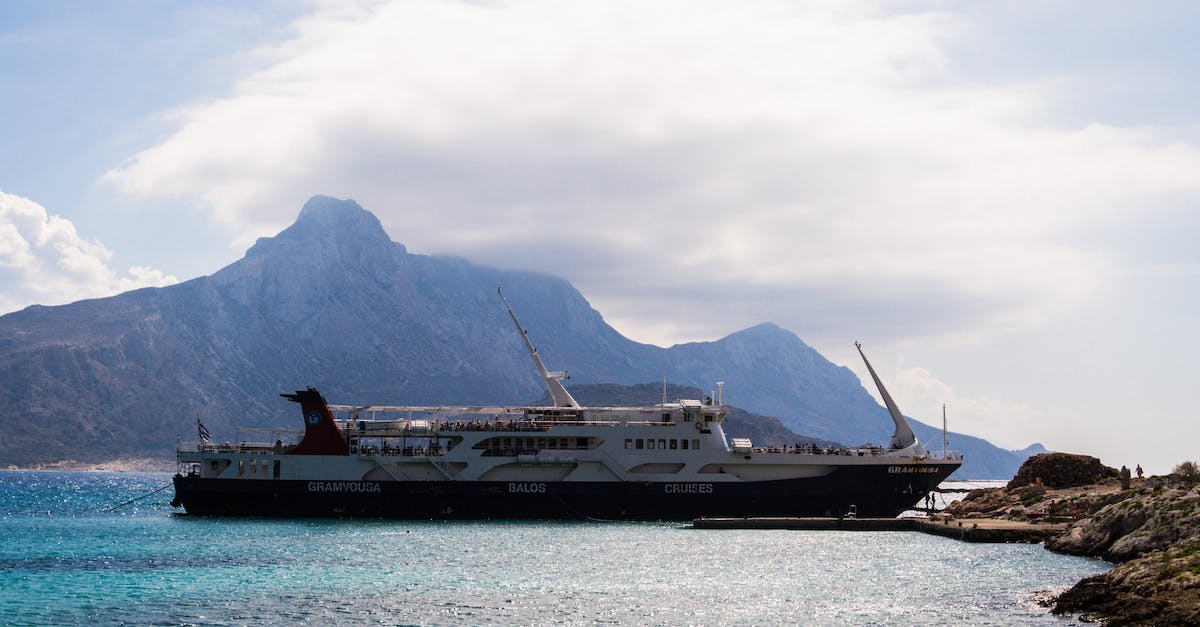 Piracy is okay: ship or augment? - A White Ship Docked Near Mountain