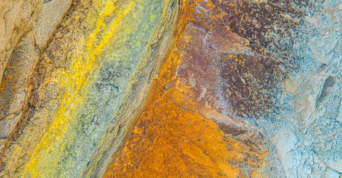 Placing lever on specific stained clay colors? [duplicate] - Brown Black and Yellow Stains on Rough Surface