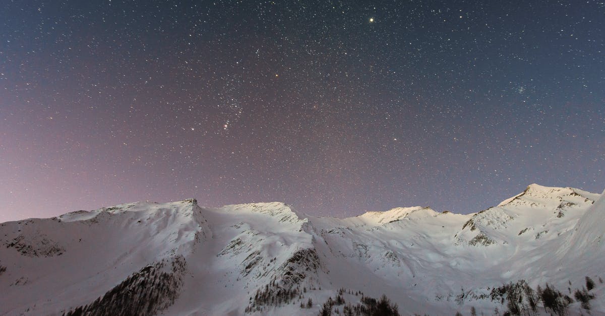 Planet not reachable by space? - Mountain Covered Snow Under Star Planet not reachable by space? - Mountain Covered Snow Under Star