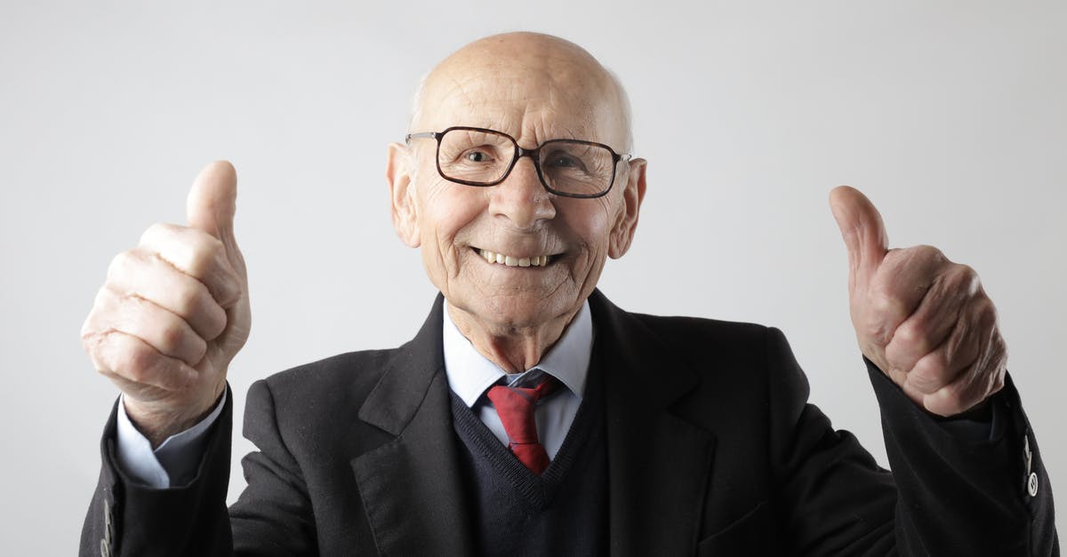 Planetary Scan Job does not show the target - Positive senior man in eyeglasses showing thumbs up and looking at camera Planetary Scan Job does not show the target - Positive senior man in eyeglasses showing thumbs up and looking at camera