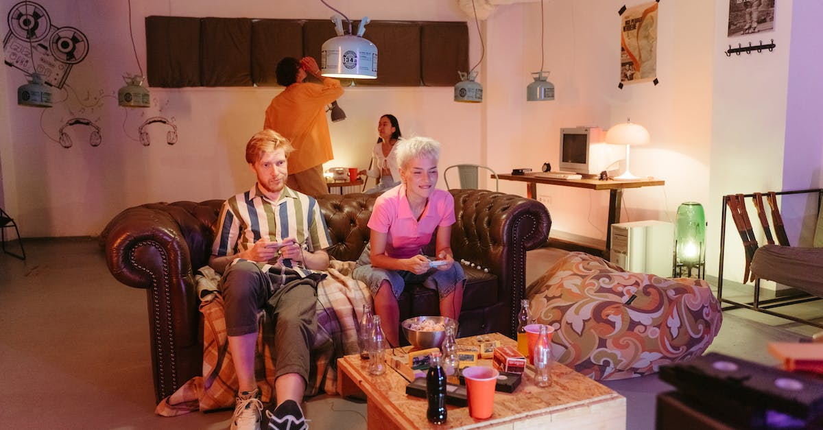 Playing games on older consoles with newer TVs with S-Video or better quality? - Group of People Sitting on Brown Couch Playing games on older consoles with newer TVs with S-Video or better quality? - Group of People Sitting on Brown Couch