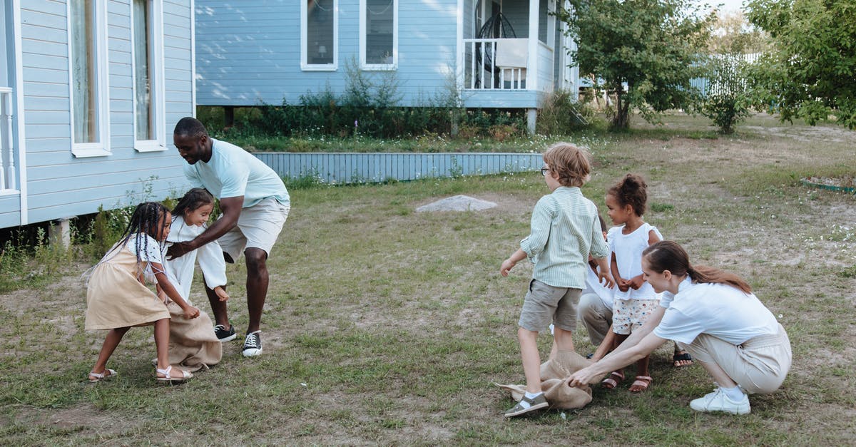 Playing games with party chat visible - Family Playing in the Front Yard Playing games with party chat visible - Family Playing in the Front Yard