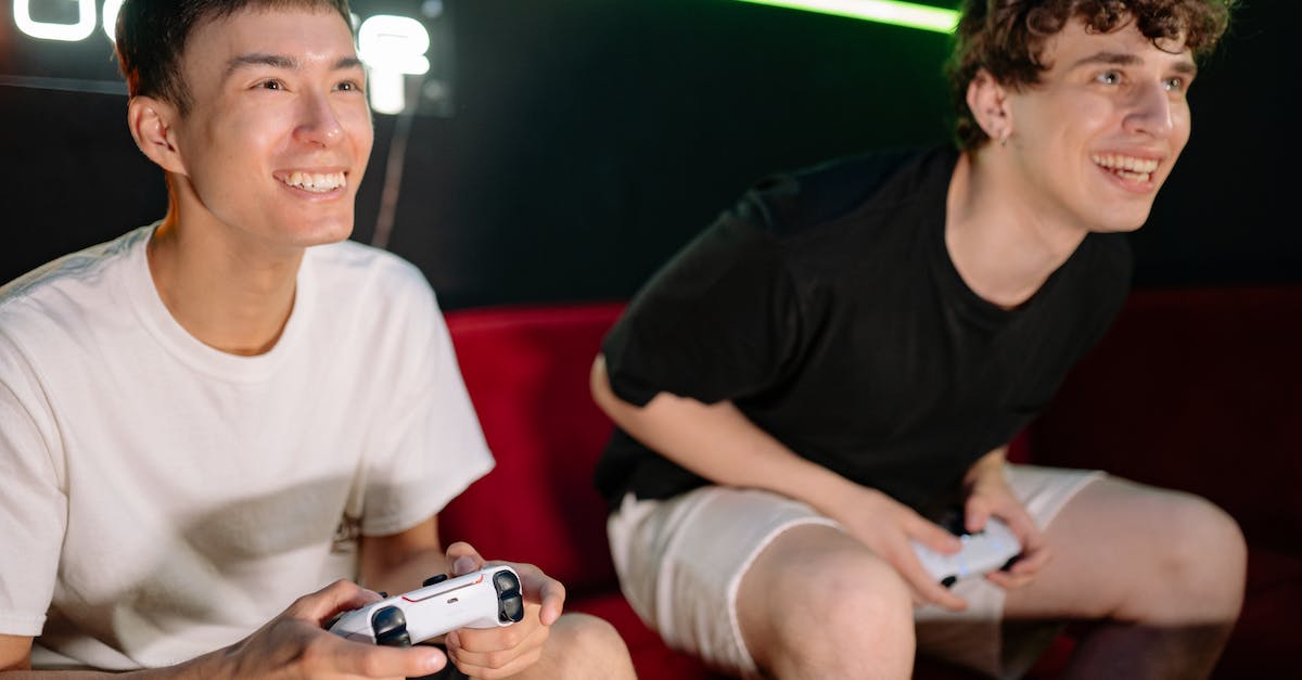 Playing Mass Effect on multiple consoles - Free stock photo of adolescent, adult, enjoyment