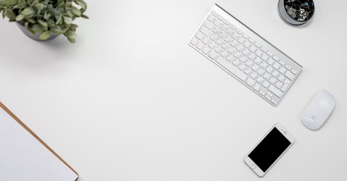 Playing mouse era games with a touchscreen or pen - White Apple Keyboard Beside White Ipad