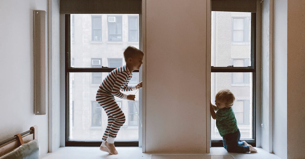 Playing TimeLapse on Windows 7 32 bit - Two Kids Playing Beside Glass Windows