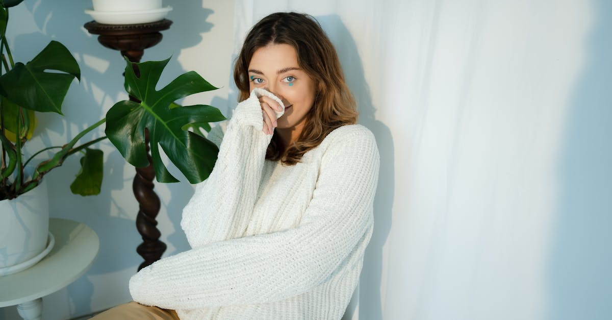 Playsound when a player leaves and area but not when they enter - Woman in White Knit Sweater Sitting on White Chair Playsound when a player leaves and area but not when they enter - Woman in White Knit Sweater Sitting on White Chair