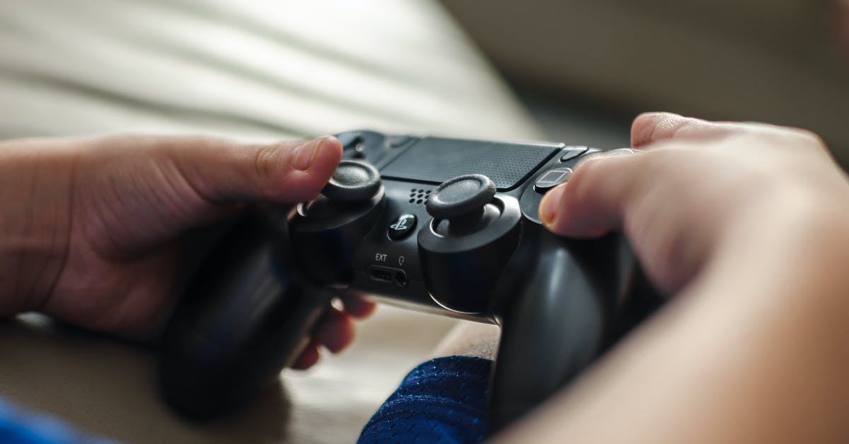 PlayStation 1 games that read saved data for other games? - Close-Up Shot of a Game Controller PlayStation 1 games that read saved data for other games? - Close-Up Shot of a Game Controller