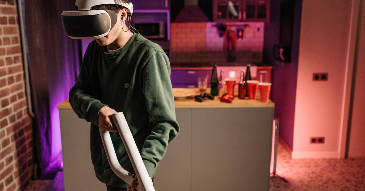 Playstation 4 compatibilities with VR headsets - A Person Wearing a VR Headset Carrying an Aim Controller Playstation 4 compatibilities with VR headsets - A Person Wearing a VR Headset Carrying an Aim Controller