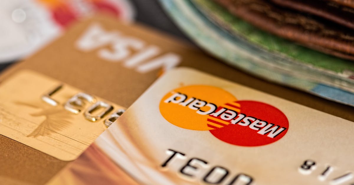 Playstation Now - Is there any way to use my PSN wallet only, instead of having to add a credit card info? - Close-up Photography Two Brown Cards