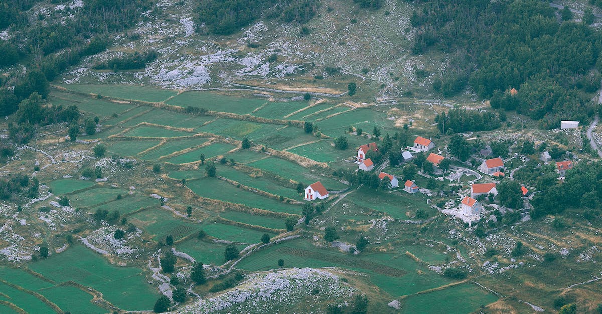 Please tell me how to make more than one building in farm and grow? - Green plantations in small village in mountainous valley Please tell me how to make more than one building in farm and grow? - Green plantations in small village in mountainous valley