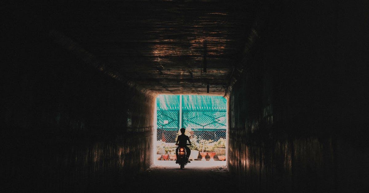 Pokemon Go logged out of my account [duplicate] - Person Riding a Motorcycle Going out from the Tunnel