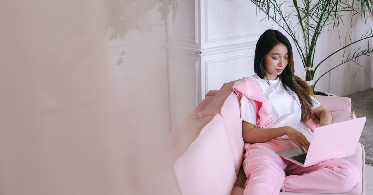 Pokemon leaves won't appear - Woman Sitting on Pink Sofa Using a Laptop