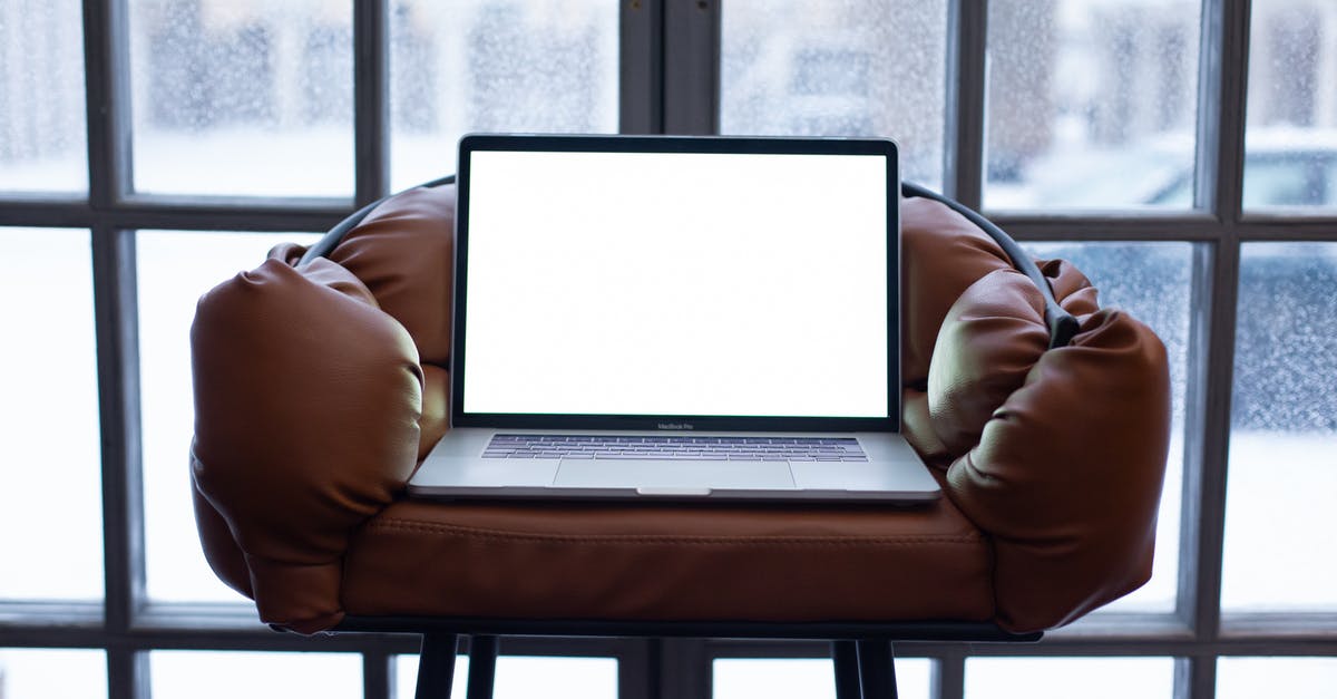 Portal 2 will not launch on windows 10, but the CD version will - Person Using Macbook on Table