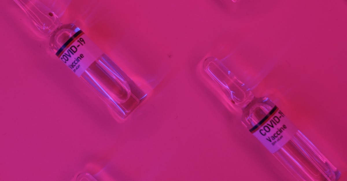 Prevent Players From Stealing From Item Frames - Ampoules with coronavirus vaccine adjuvants placed on pink desk