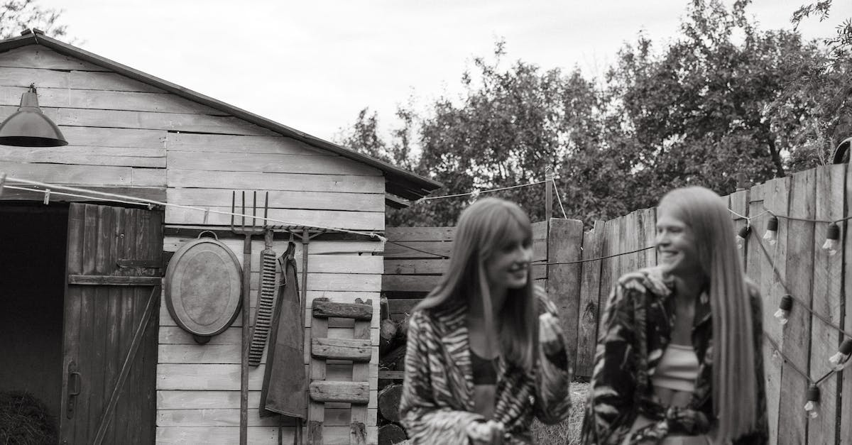 Primal Groudon Not Reappearing in Omega Ruby after blacking out [duplicate] - Grayscale Photo of 3 Women Standing Near Wooden House