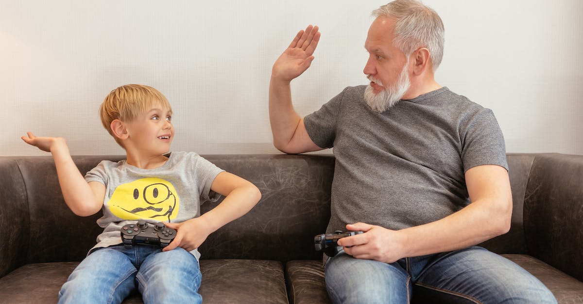 Print position in console - A Grandfather and a Boy Playing Console Game Print position in console - A Grandfather and a Boy Playing Console Game