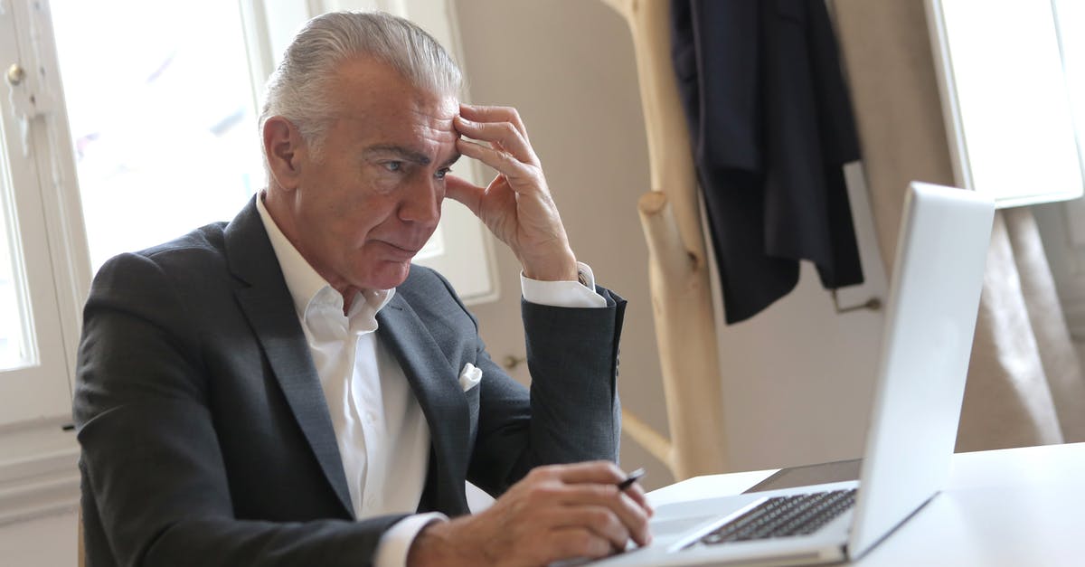Problem defending Tihr - Man in Black Suit Jacket While Using Laptop Problem defending Tihr - Man in Black Suit Jacket While Using Laptop