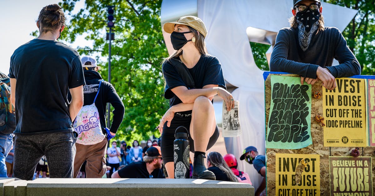 Problem defending Tihr - Group of people in masks on protest Problem defending Tihr - Group of people in masks on protest