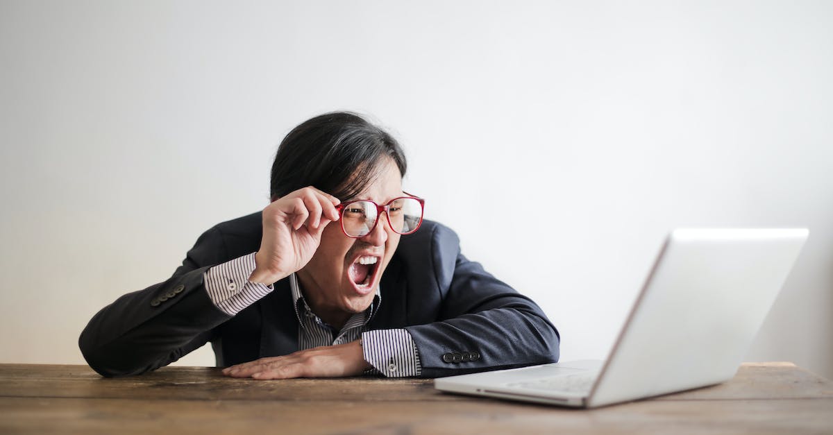 Problem with execute command in minecraft - Modern Asian man in jacket and glasses looking at laptop and screaming with mouth wide opened on white background Problem with execute command in minecraft - Modern Asian man in jacket and glasses looking at laptop and screaming with mouth wide opened on white background